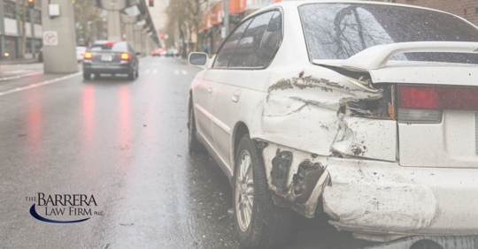 White car with back left side smashed.